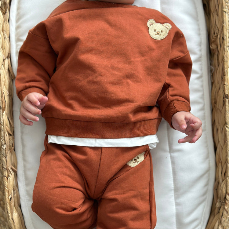 Baby tracksuits collection with soft fabrics and charming designs, perfect for active little ones.