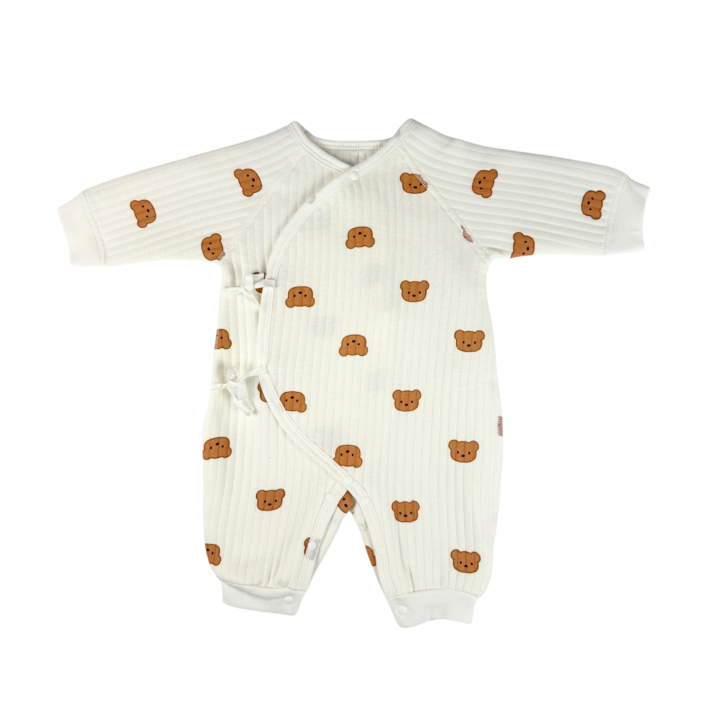 Baby romper with soft bouclé fabric and a playful bear print, designed for comfort and style